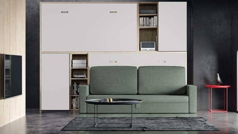 mueble con litera abatible contrapeada, que incorpora sofá frontal y armarios.