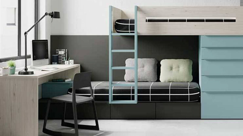 Litera tren con cajones y gavetas para almacenamiento en habitación infantil
