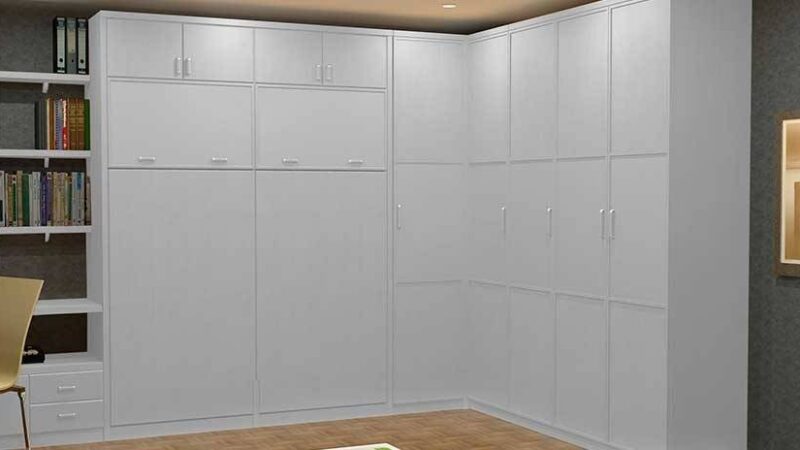 Armario con dos camas abatibles en vertical, totalmente integrado en el mueble cama