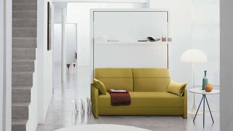 mueble con cama de matrimonio abatible y sofá frontal. Minimalista.