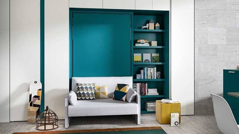 mueble cama color turquesa fuerte con sofá frontal pequeño color blanco.
