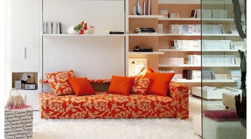 Mueble cama abatible con sofá delante