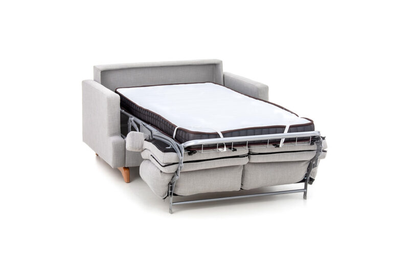 Sofá cama pequeño 90x190 de diseño urbano, apertura italiana y colchón HR de alta densidad con patas de madera estilo nórdico. Diseño abierto.