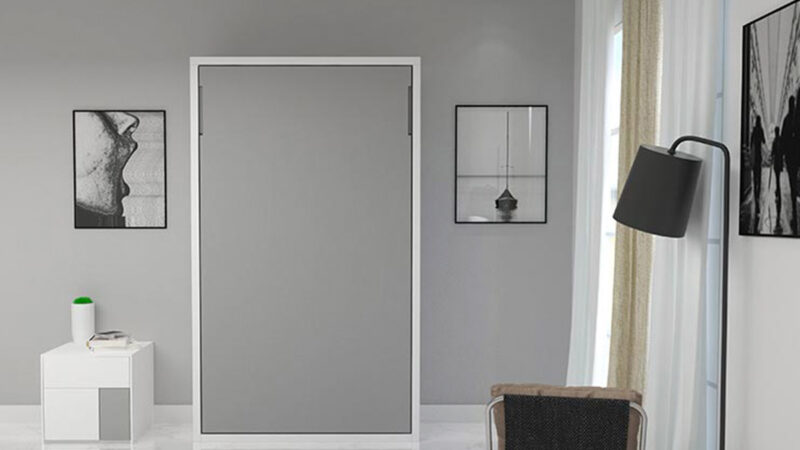 Cama abatible a medida con somier de lamas y acabado en laca, diseñada para optimizar espacio y adaptarse a cualquier estilo y colchón.