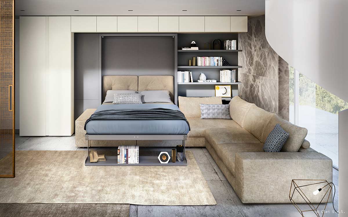 Mueble cama abatible autoportante con sofá y estanterías modulares de gran calidad.