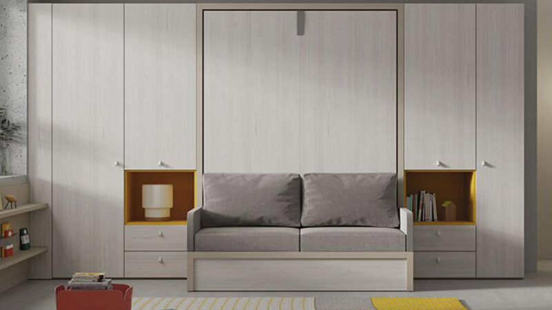 Sofá que se desliza bajo la cama abatible dejando el espacio listo para dormir