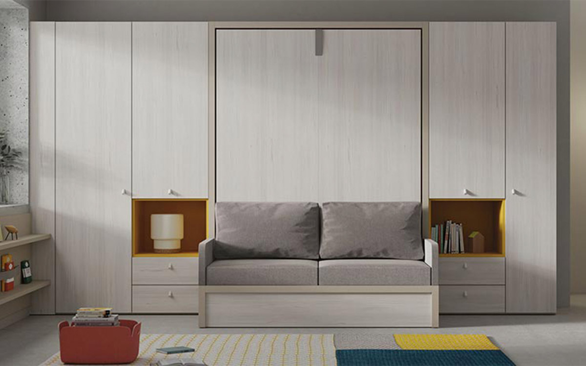 Sofá que se desliza bajo la cama abatible dejando el espacio listo para dormir