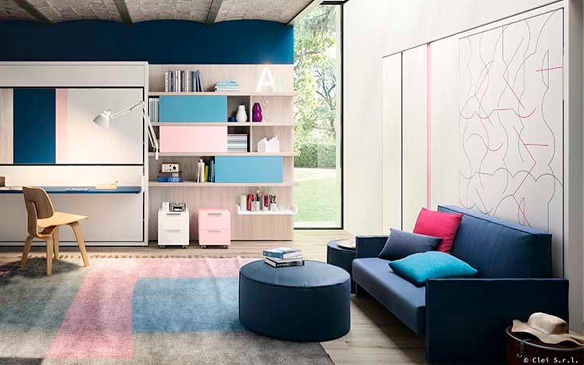 Cama abatible individual autoportante con sofá de espuma desenfundable y librería oculta integrada.