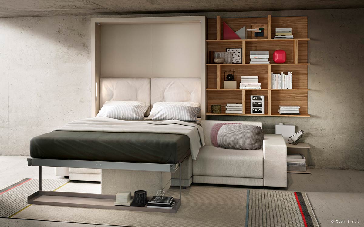 Cama abatible de matrimonio con gran sofá de estilo nórdico desenfundable.