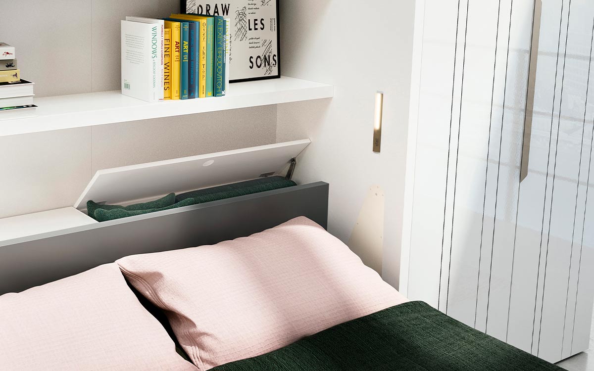Mueble cama abatible de matrimonio con escritorio pivotante integrado y apertura segura.