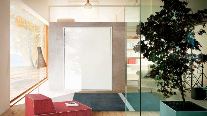 Cama abatible de matrimonio con apertura vertical y somier de láminas patentado.