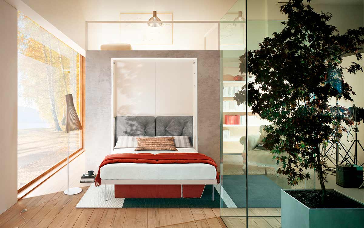 Cama abatible de matrimonio con apertura vertical y somier de láminas patentado.