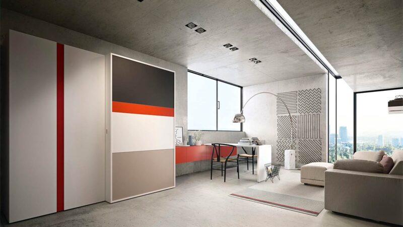 Módulo de cocina y comedor escamoteable con mesa y electrodomésticos integrados.