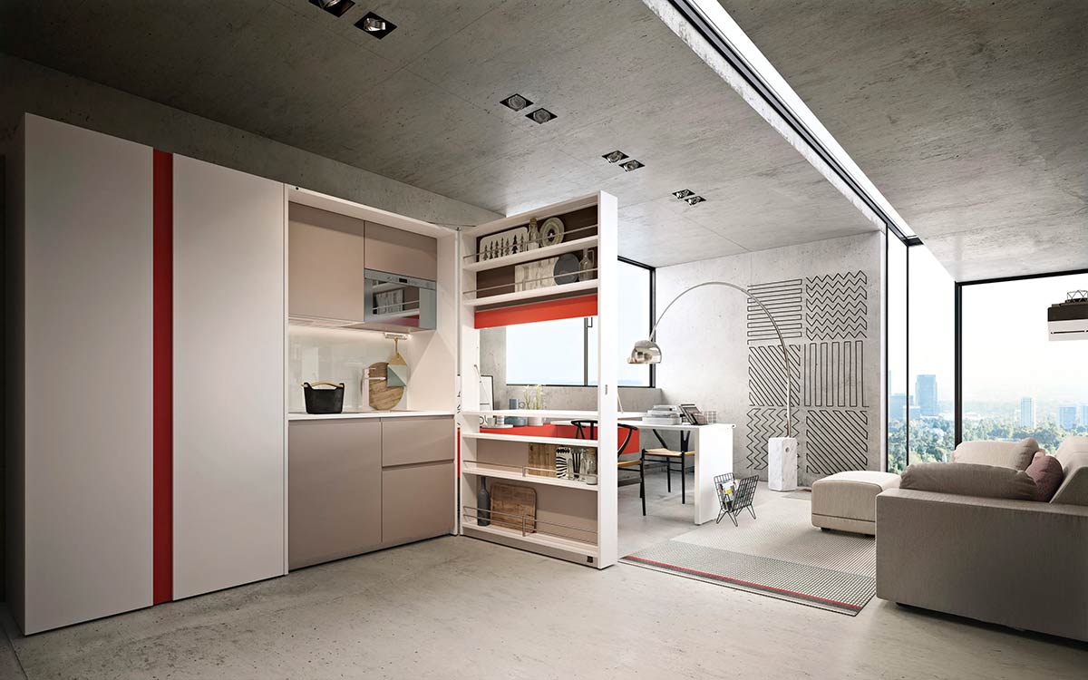 Módulo de cocina y comedor escamoteable con mesa y electrodomésticos integrados.