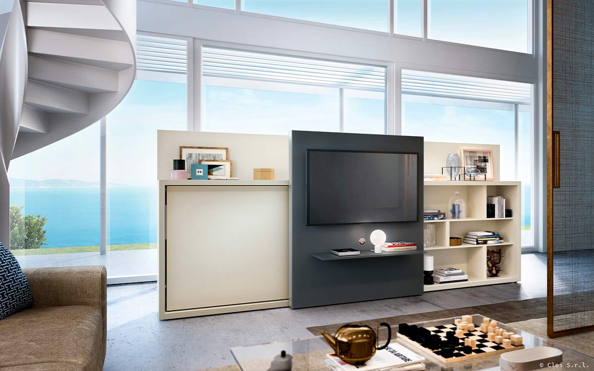 Mueble cama abatible individual con estantería lateral y panel deslizante para TV.