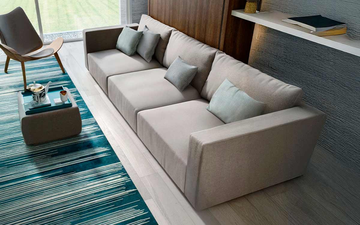 Mueble cama abatible de matrimonio con sofá integrado y asientos extensibles.