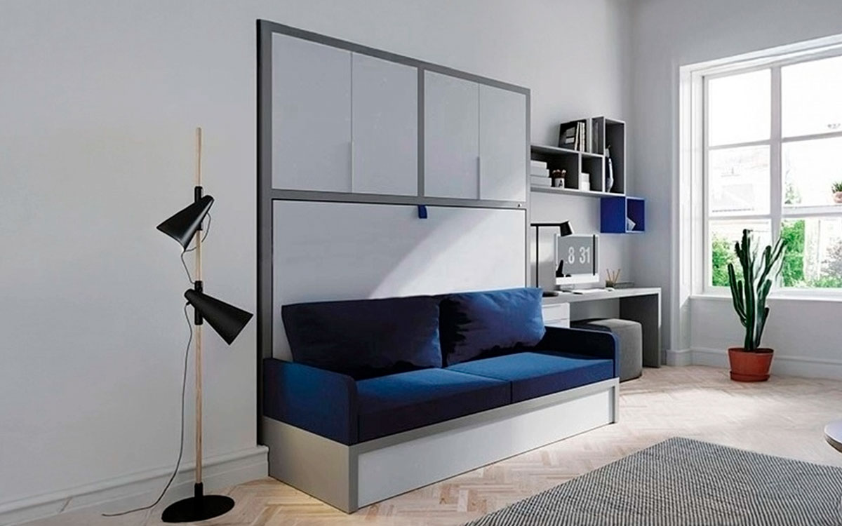 Cama doble abatible horizontal con sofá integrado, ideal para aprovechar espacios reducidos.
