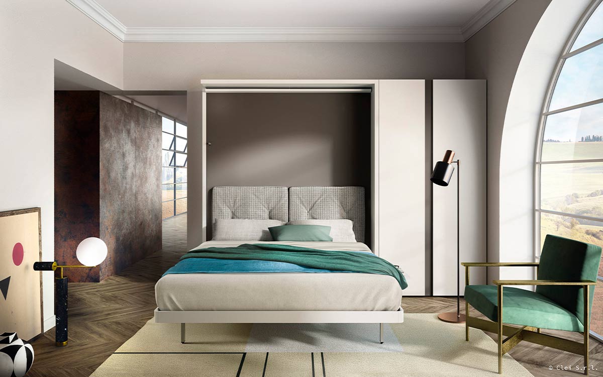 Mueble cama giratoria con librería y armario frontal integrados.