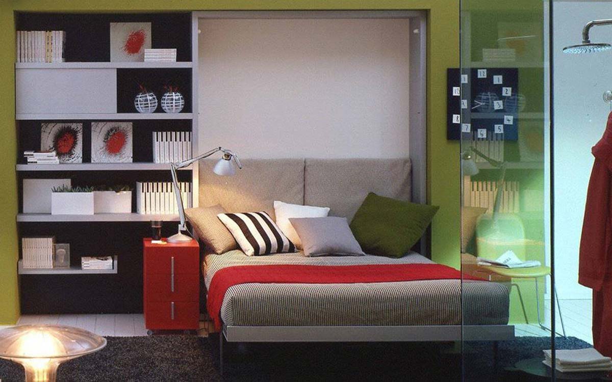 Cama de matrimonio abatible con escritorio frontal plegable y diseño funcional.