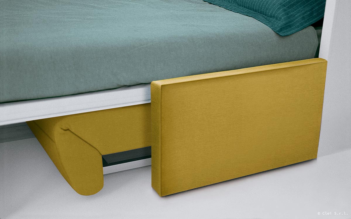 Mueble cama abatible vertical con sofá relax y reposapiés integrado.