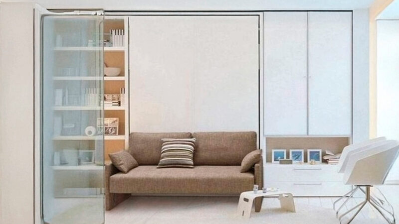 Mueble cama abatible de matrimonio con sofá integrado compacto.