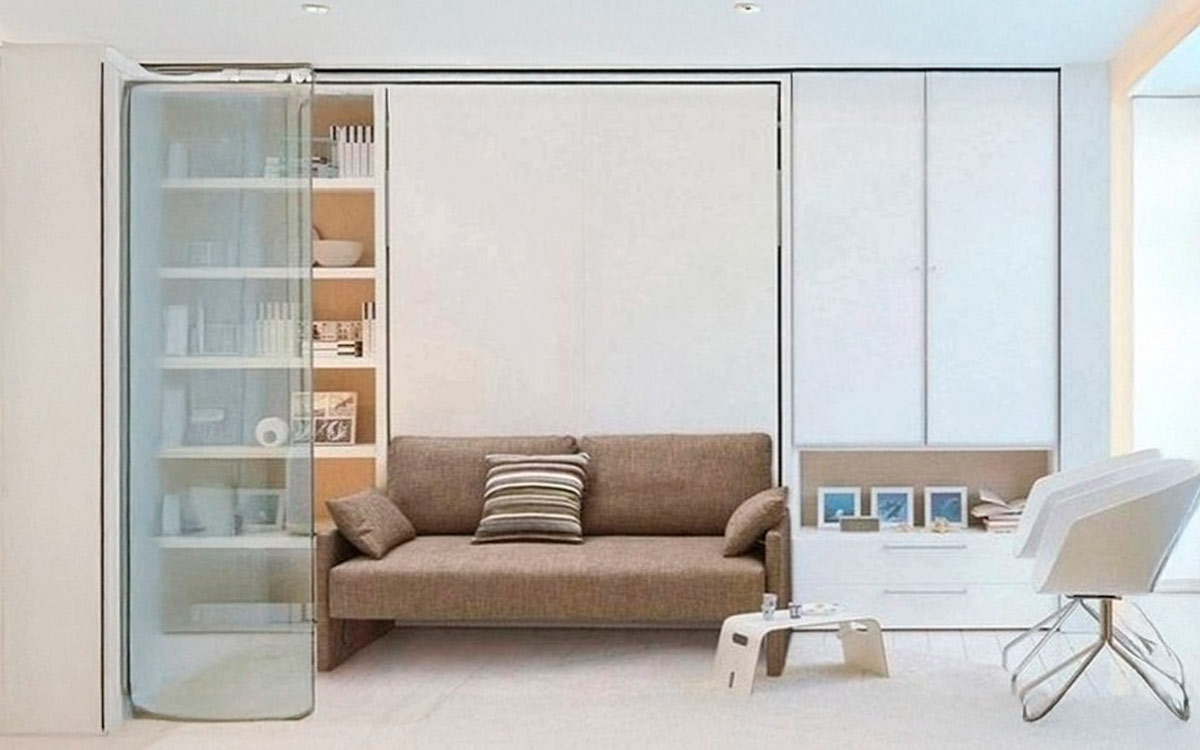 Mueble cama abatible de matrimonio con sofá integrado compacto.