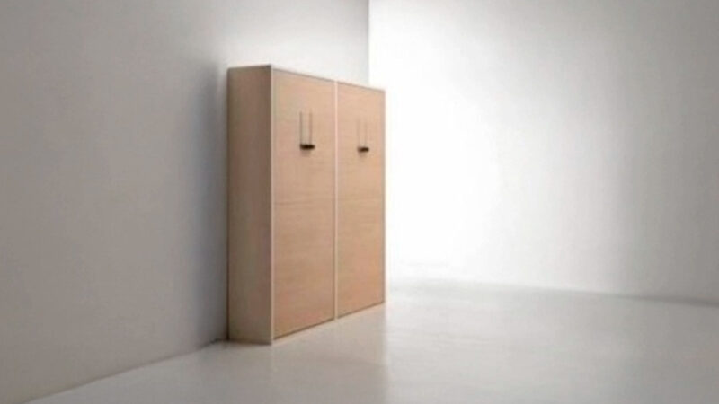 Mueble con dos camas abatibles gemelas de líneas depuradas.
