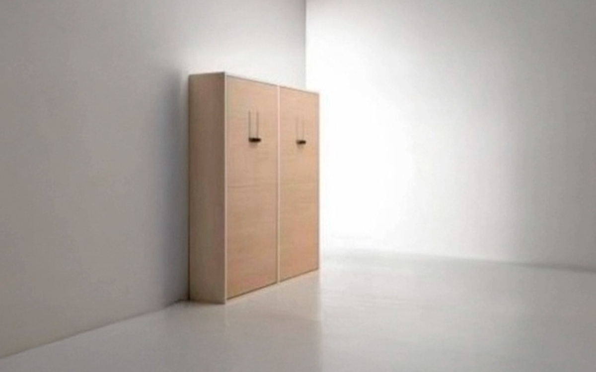 Mueble con dos camas abatibles gemelas de líneas depuradas.